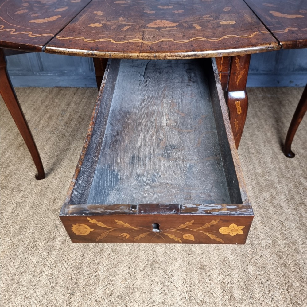 An 18th century marquetry table.  View XIII