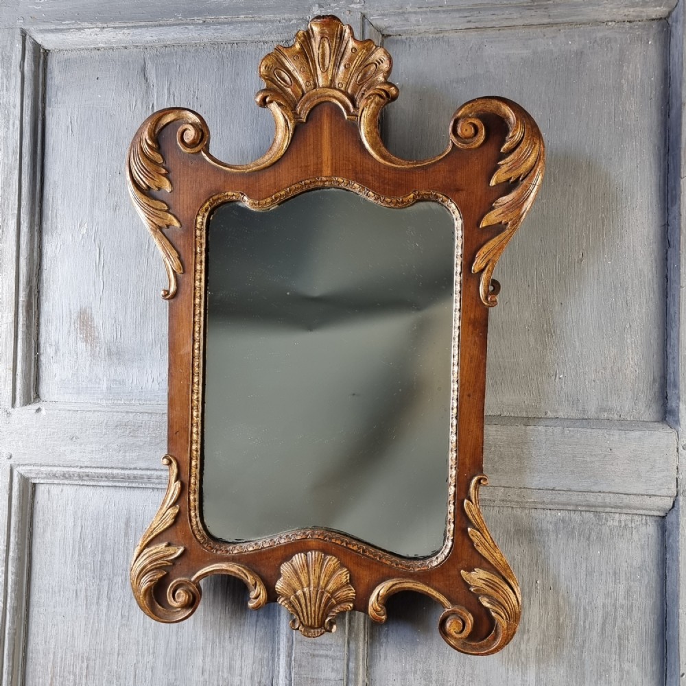 A small 18th century style mirror. 