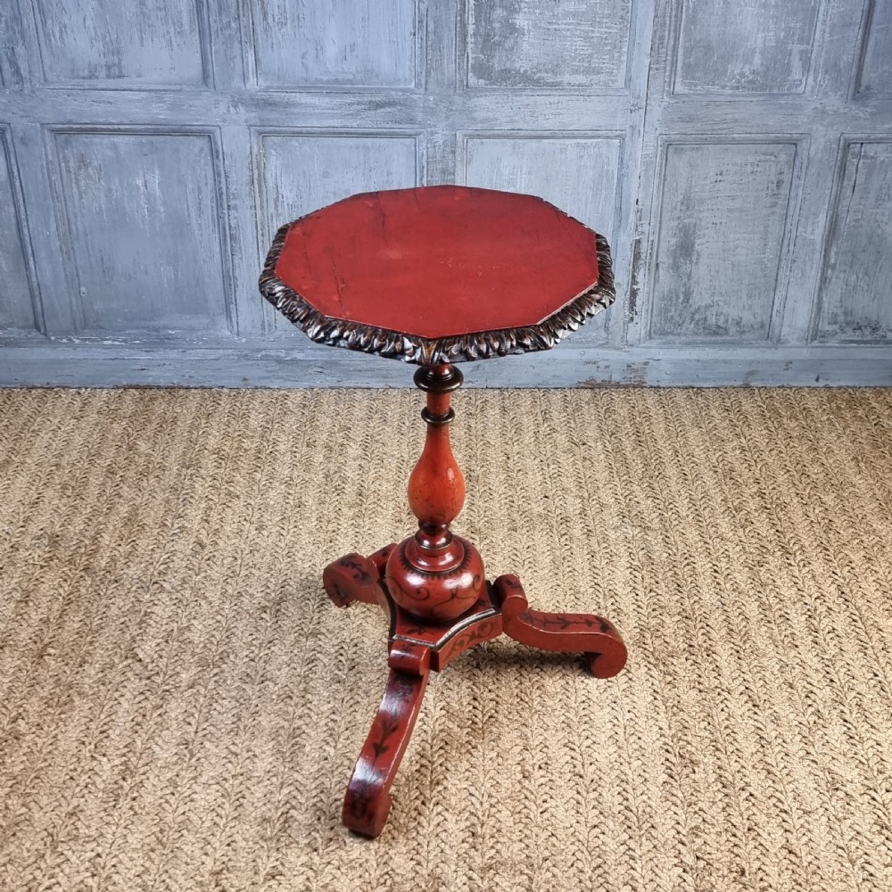 A late 17th century red laquered wine table.   View V