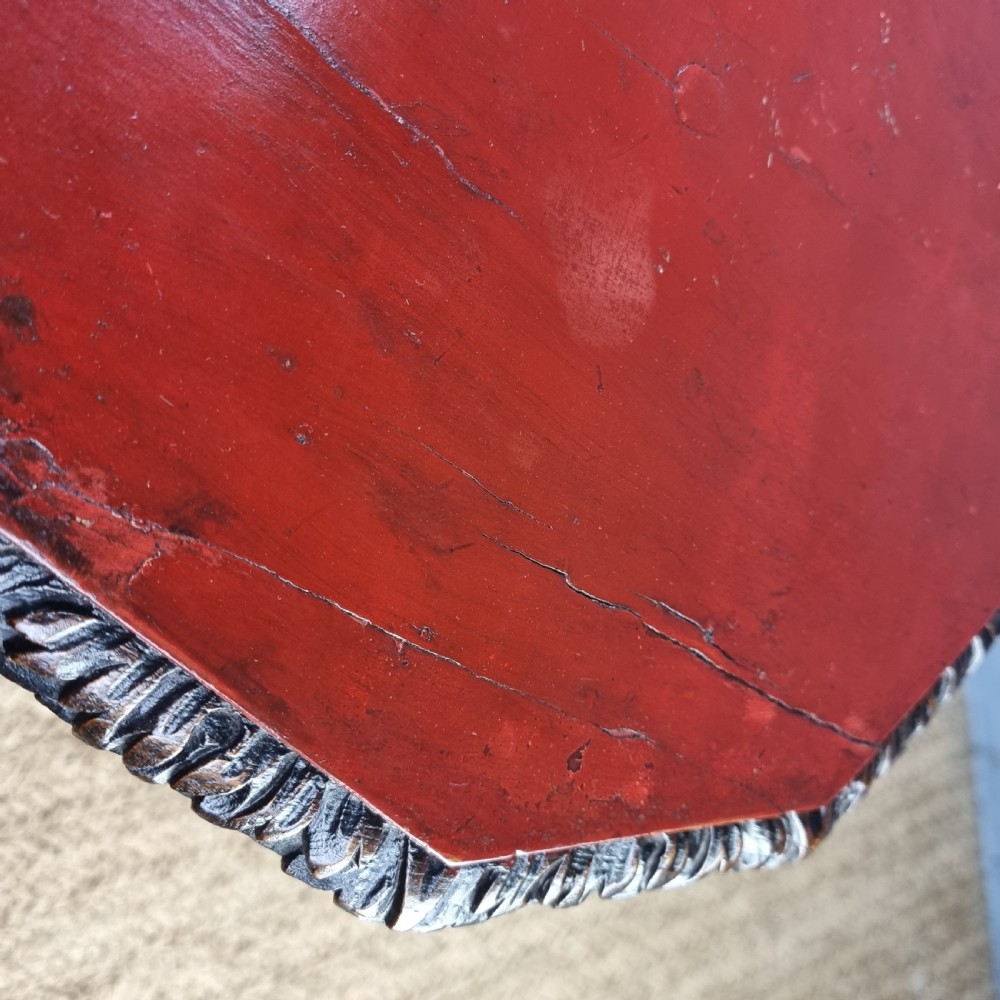 A late 17th century red laquered wine table.   View XVI