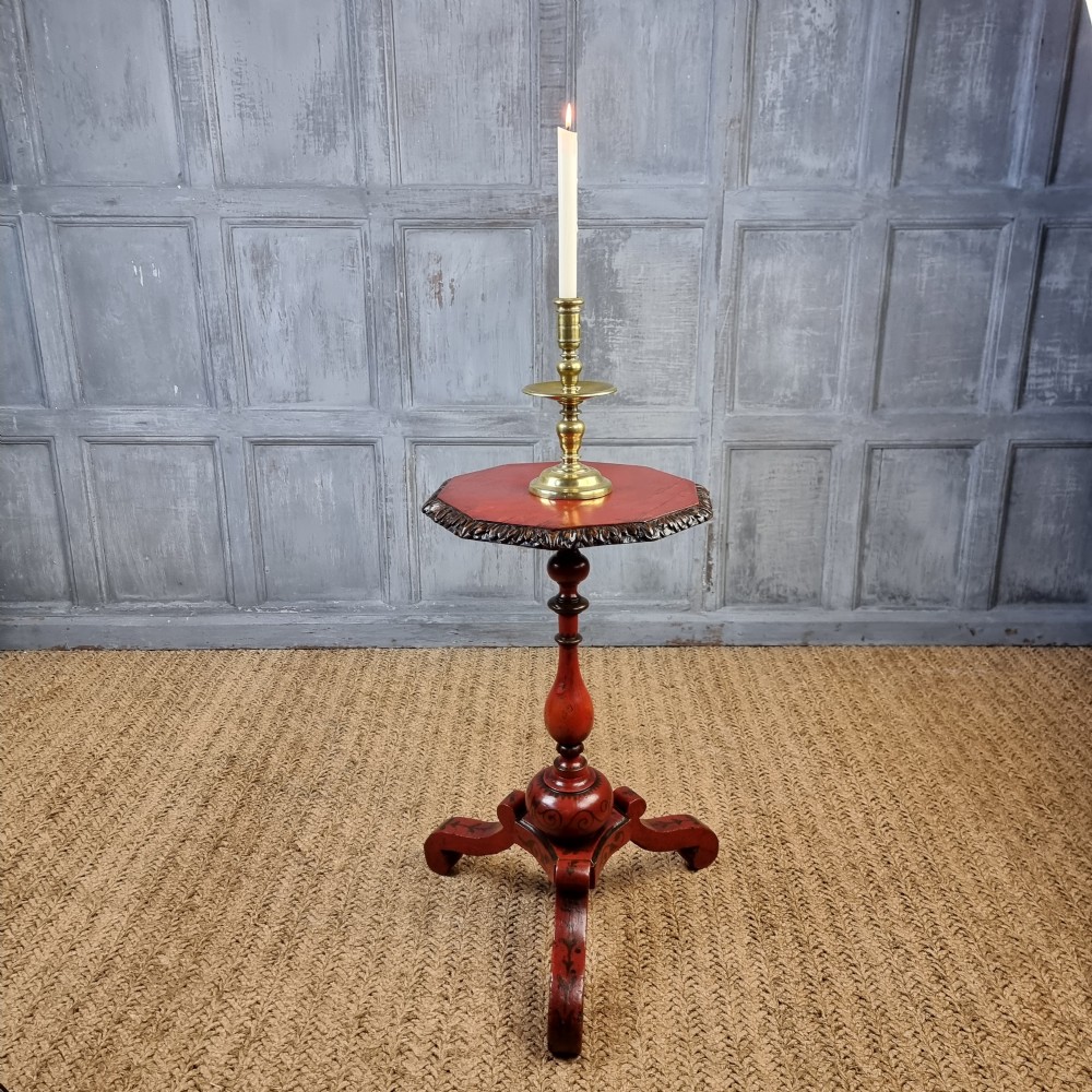 A late 17th century red laquered wine table.  