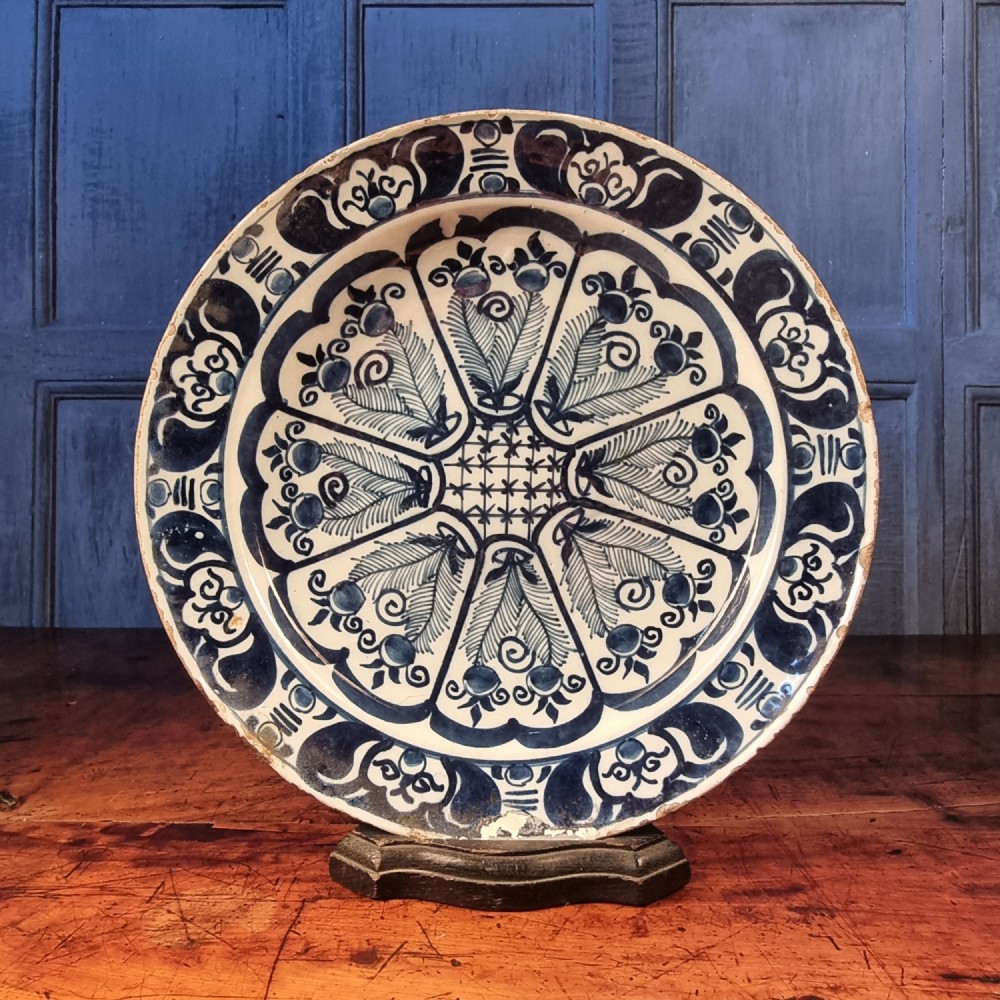 A large 18th century delft plate. 