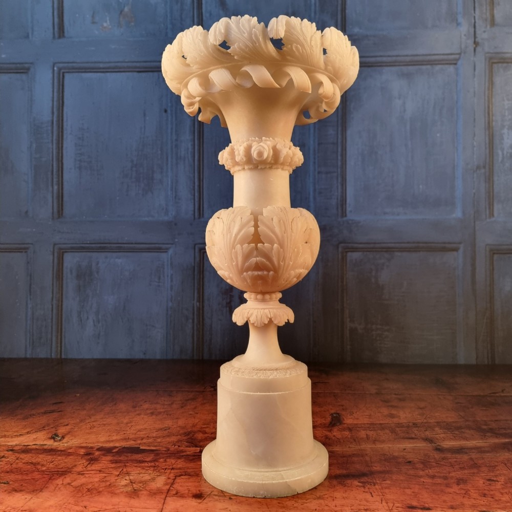 A large 19th century alabaster urn. 