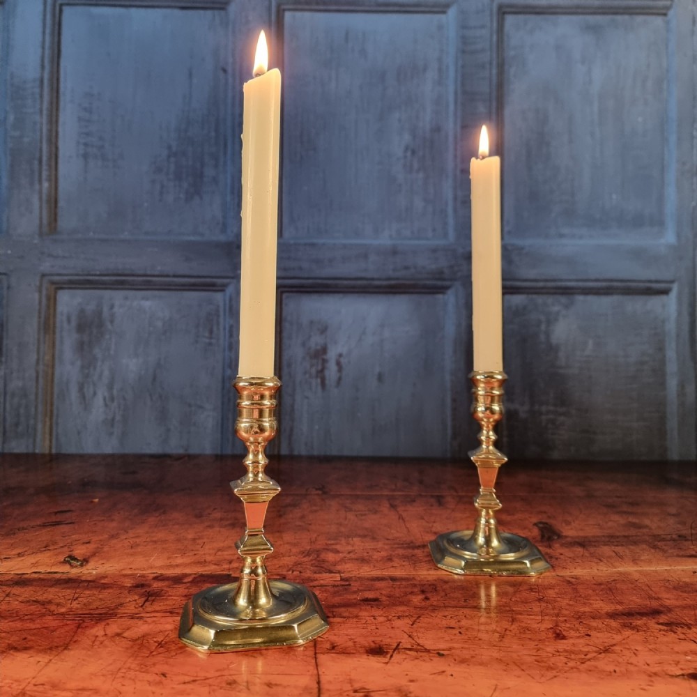 A pair of 18th century candlesticks. 