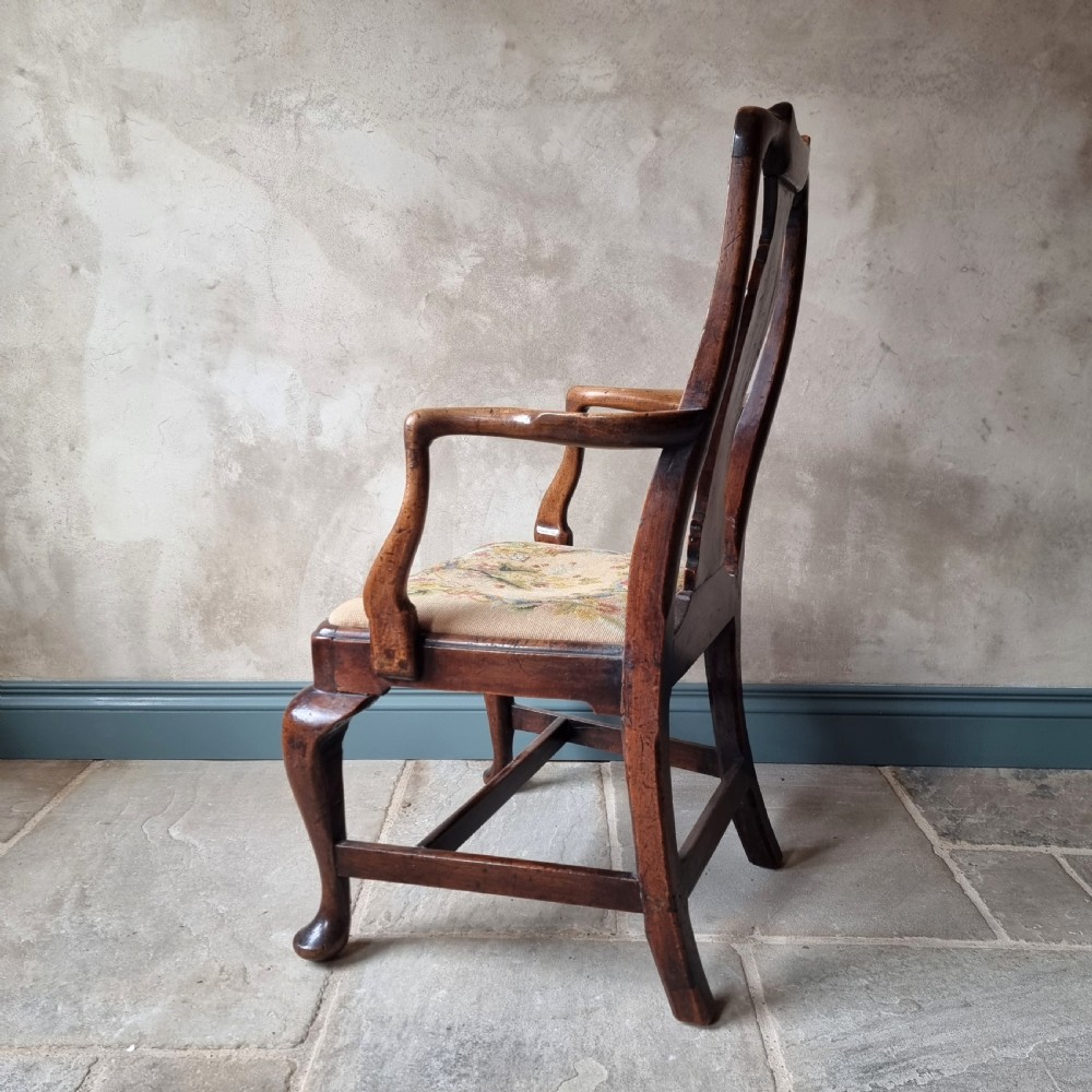 A fine 18th century walnut armchair.  View XI