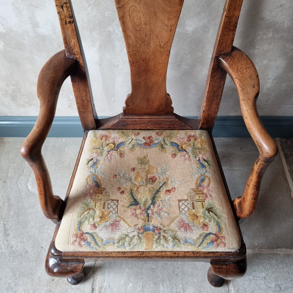 A fine 18th century walnut armchair.  View XII