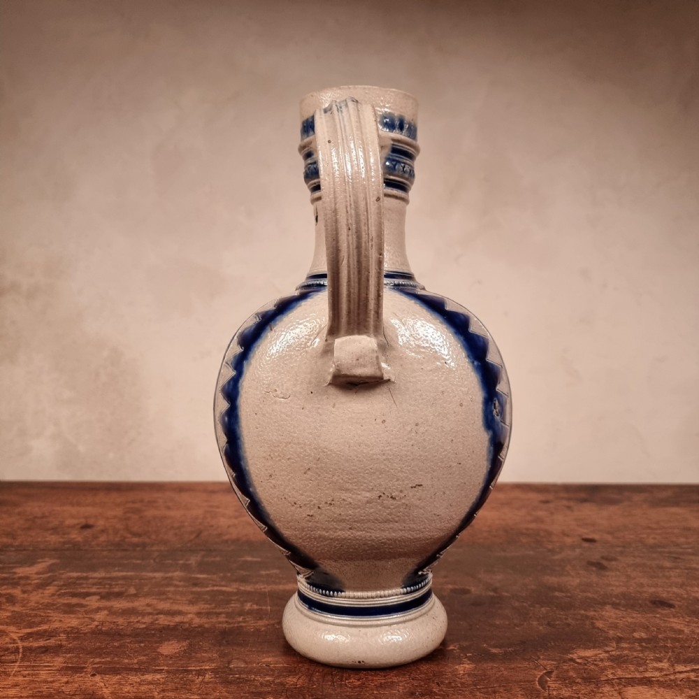 A religious 17th -18th century westerwald jug.  View VI