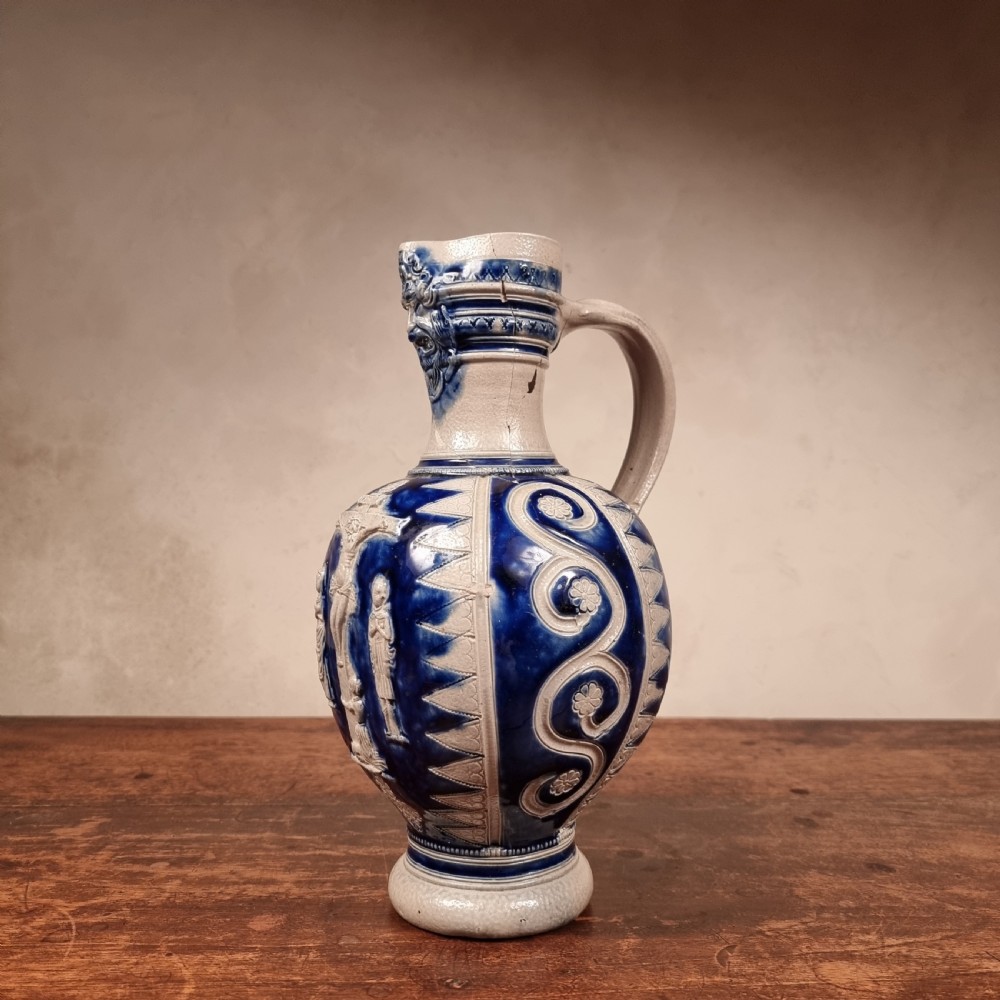 A religious 17th -18th century westerwald jug.  View VIII