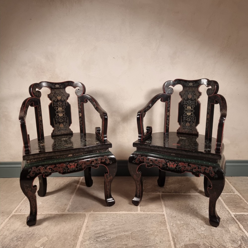 A pair of 20th century chinese armchairs. 