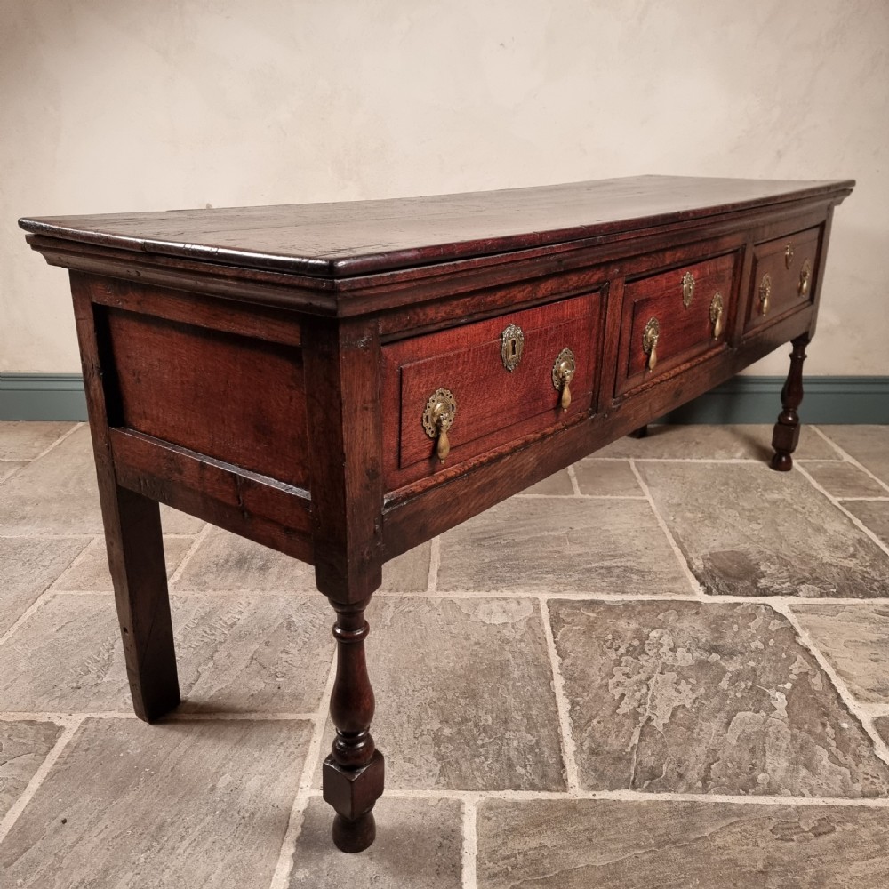 A late 17th century dresser base.  View VII