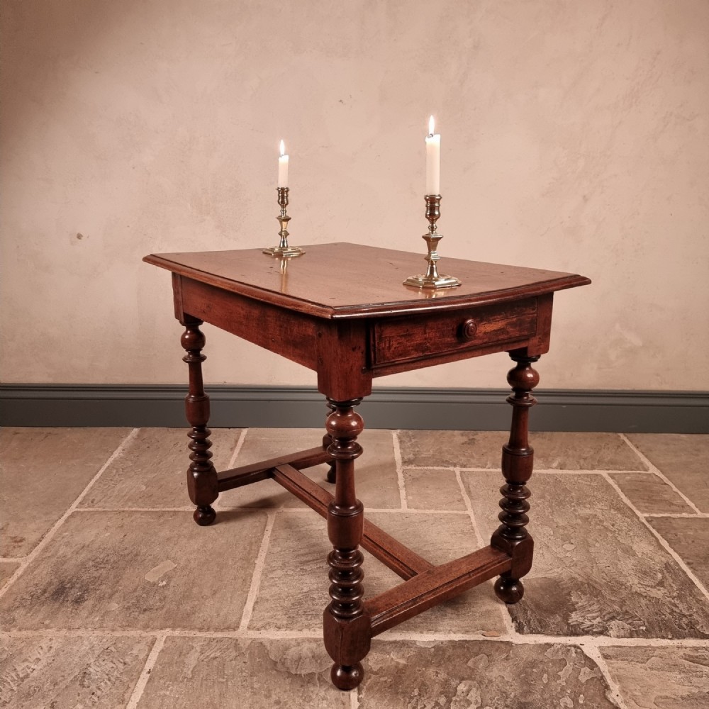 A 19th century walnut side table.