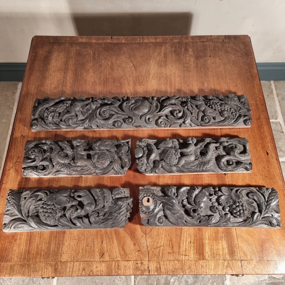 A group of 17th century carvings. 