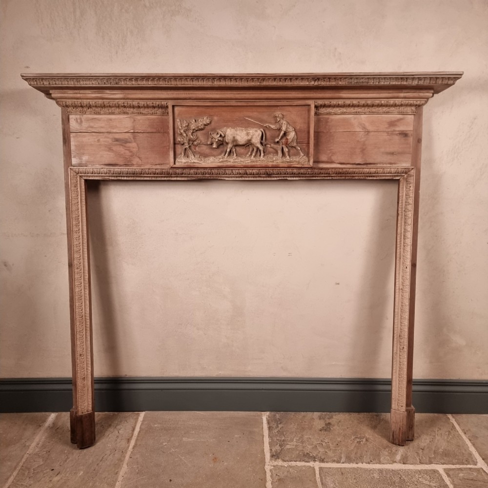 A 19th century carved fire surround. 
