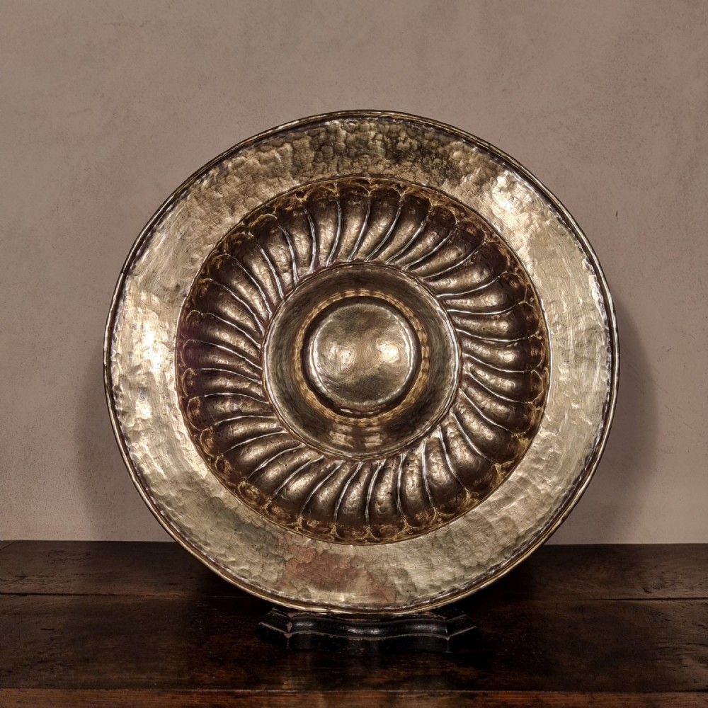 A late 16th - early 17th century alms dish. 