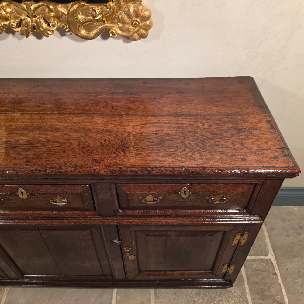An early 18th century dresser base. View VI