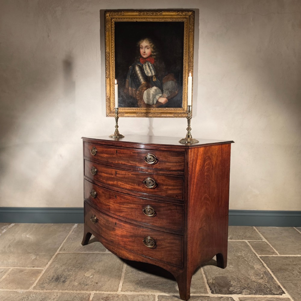A Georgian bow front chest of drawers.  View XIII