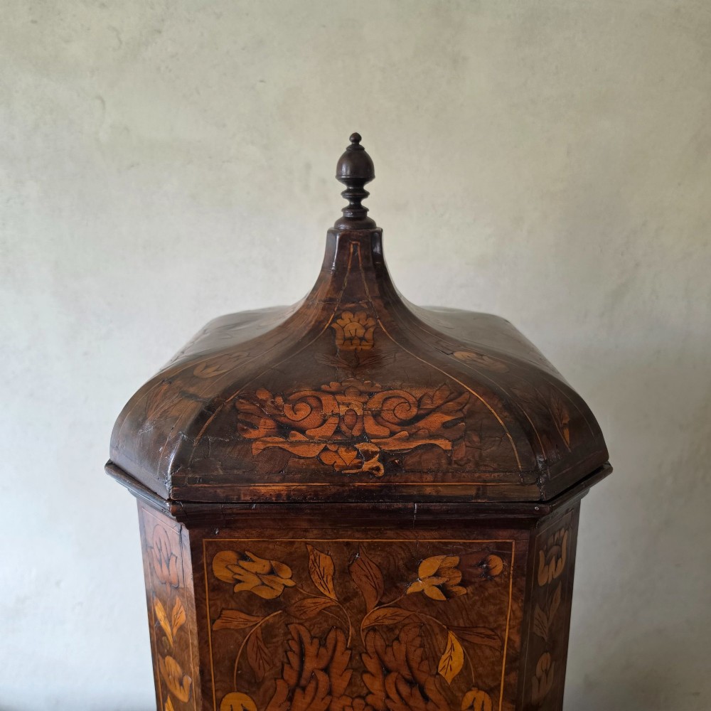 An 18th century marquetry wine cooler. View II
