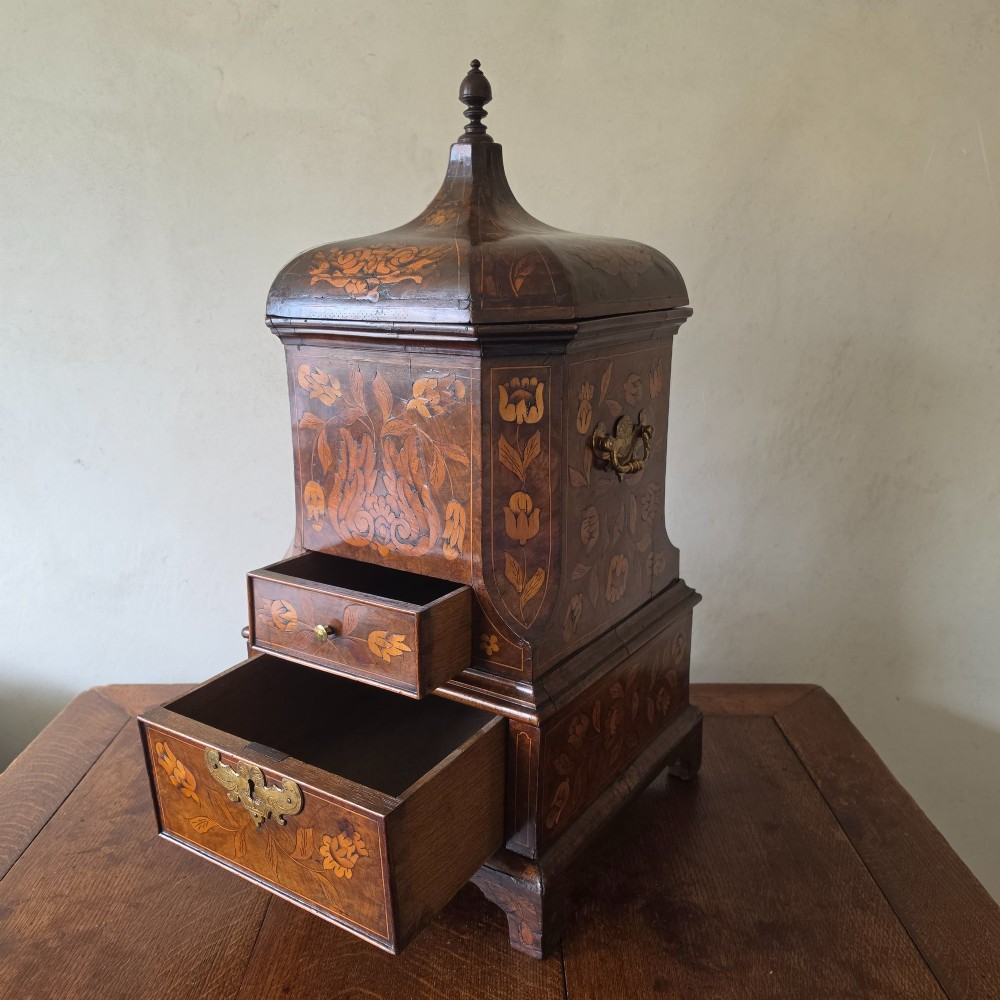 An 18th century marquetry wine cooler. View IV