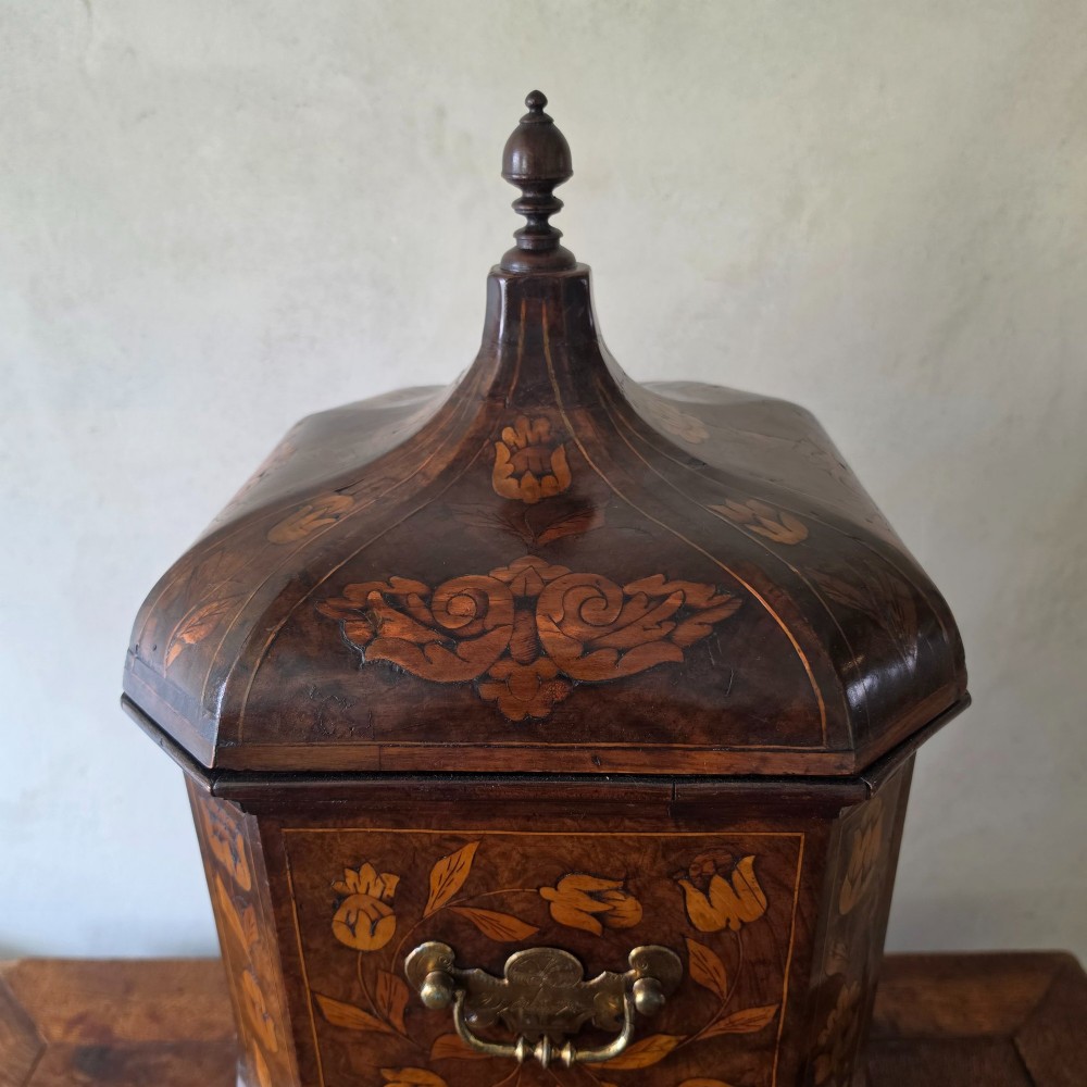 An 18th century marquetry wine cooler. View VI