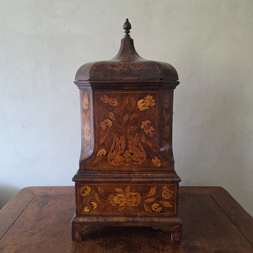An 18th century marquetry wine cooler. View VII