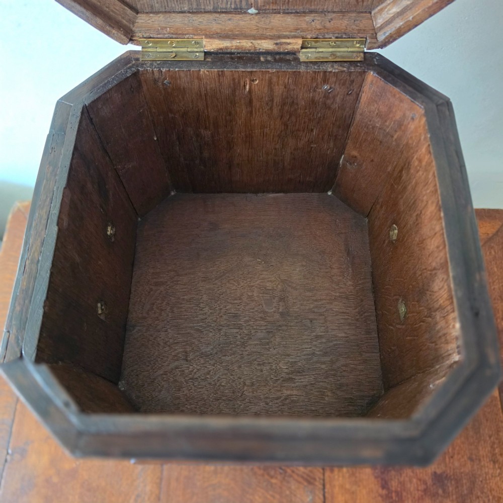An 18th century marquetry wine cooler. View VIII