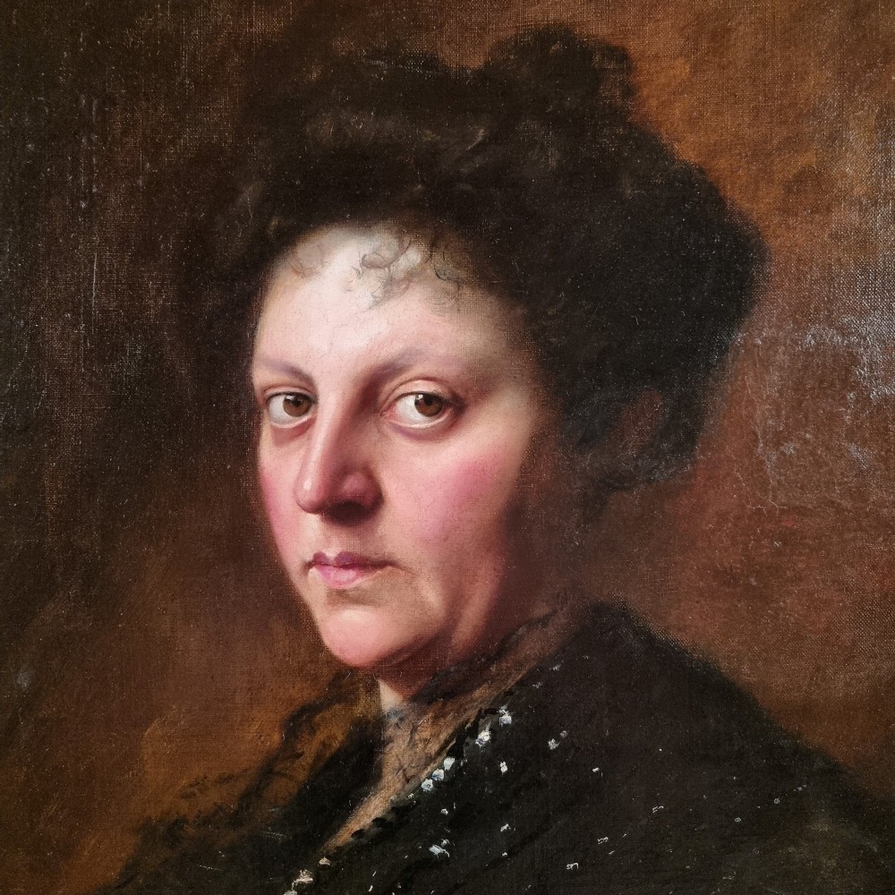 An Edwardian oil portrait of a lady framed in a wide burr wood moulding with a gilded inner border. View III
