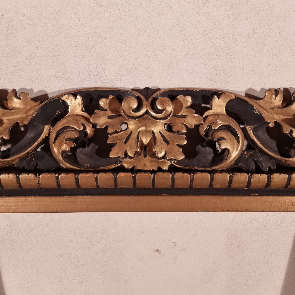 A large nineteenth-century rectangular giltwood frame featuring elaborate openwork acanthus leaf carvings and a gadrooned inner border. View IV
