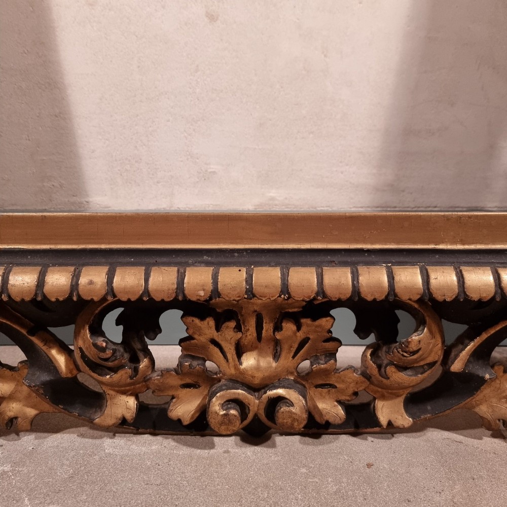 A large nineteenth-century rectangular giltwood frame featuring elaborate openwork acanthus leaf carvings and a gadrooned inner border. View VIII