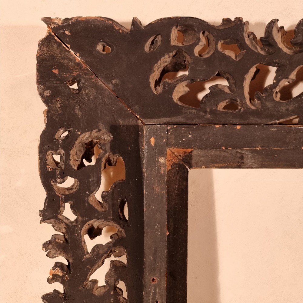 A large nineteenth-century rectangular giltwood frame featuring elaborate openwork acanthus leaf carvings and a gadrooned inner border. View XIV