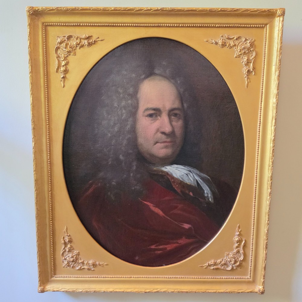 An 18th century portrait in the manner of Allan Ramsey 1713 - 1784.