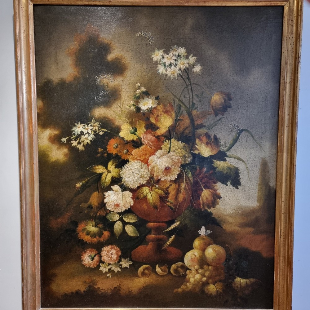 An 18th-century style oil painting on canvas depicting a floral arrangement in an urn with fruit at the base, housed within a gilded wooden frame. View VIII
