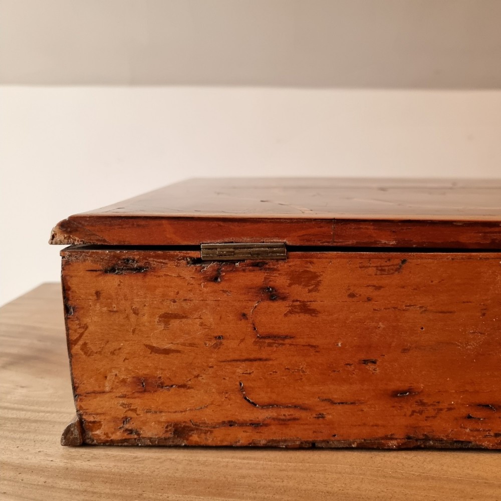 A rectangular William and Mary period walnut lace box featuring concentric oyster veneer patterns on the hinged lid. View X