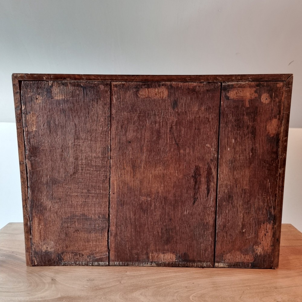 A rectangular William and Mary period walnut lace box featuring concentric oyster veneer patterns on the hinged lid. View XII