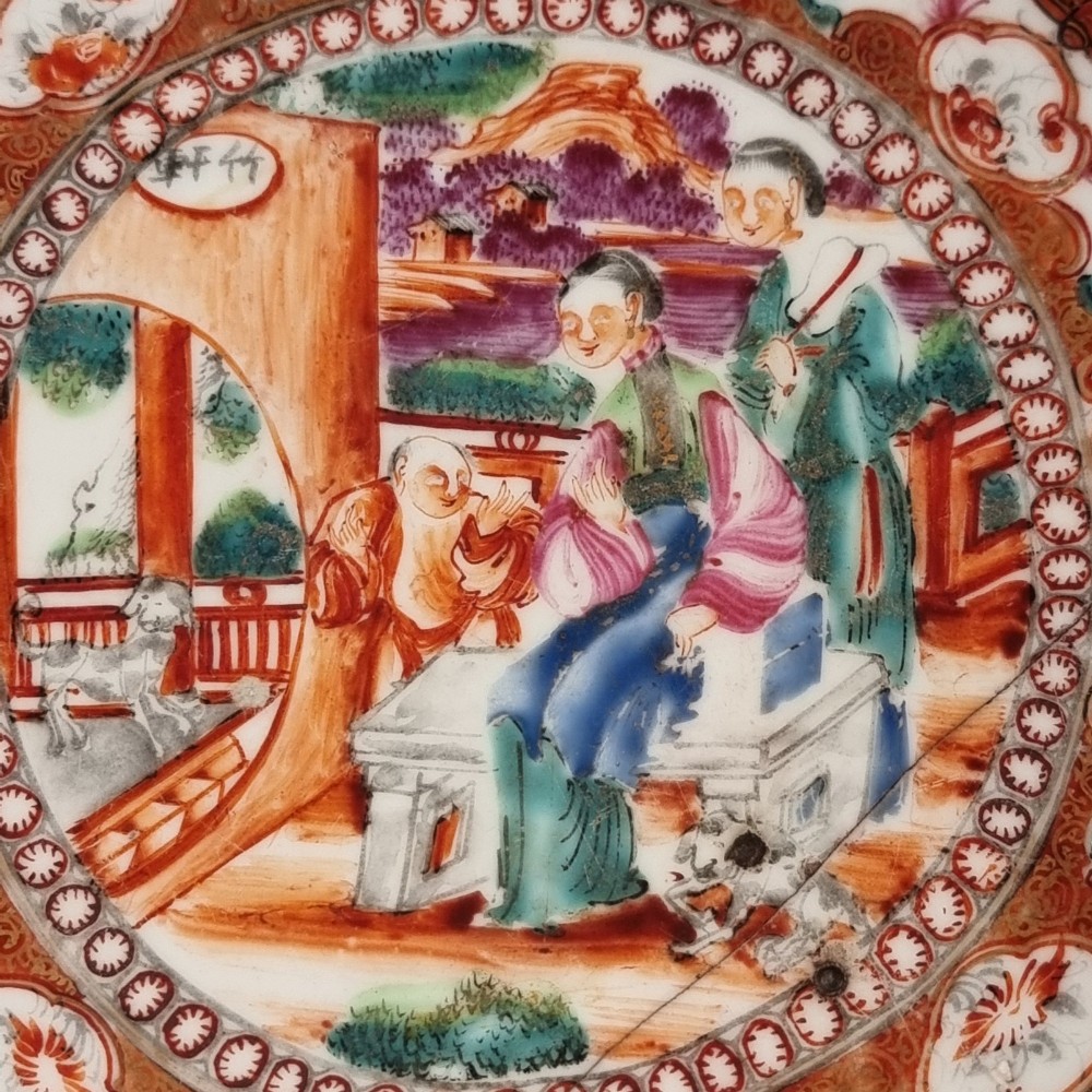 A 19th-century Chinese porcelain bowl featuring hand-painted polychrome figural scenes and a metal-bound rim. View XIII