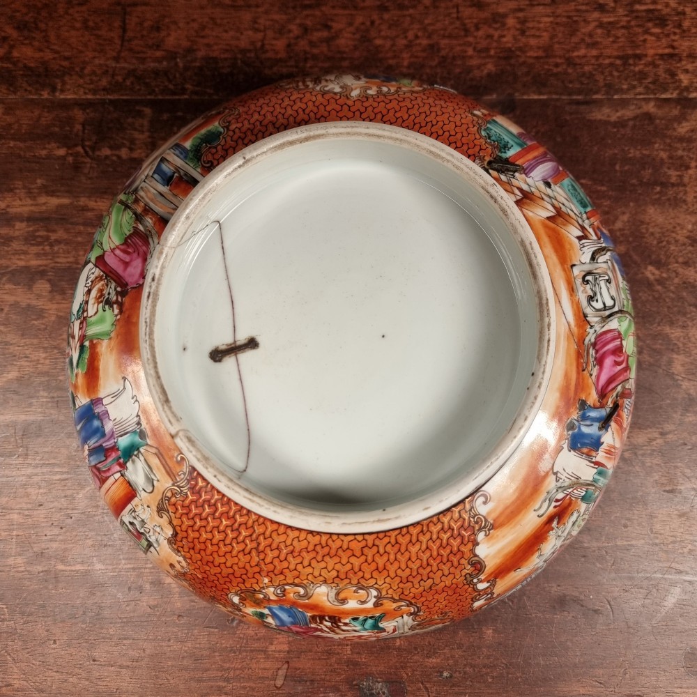 A 19th-century Chinese porcelain bowl featuring hand-painted polychrome figural scenes and a metal-bound rim. View XIV