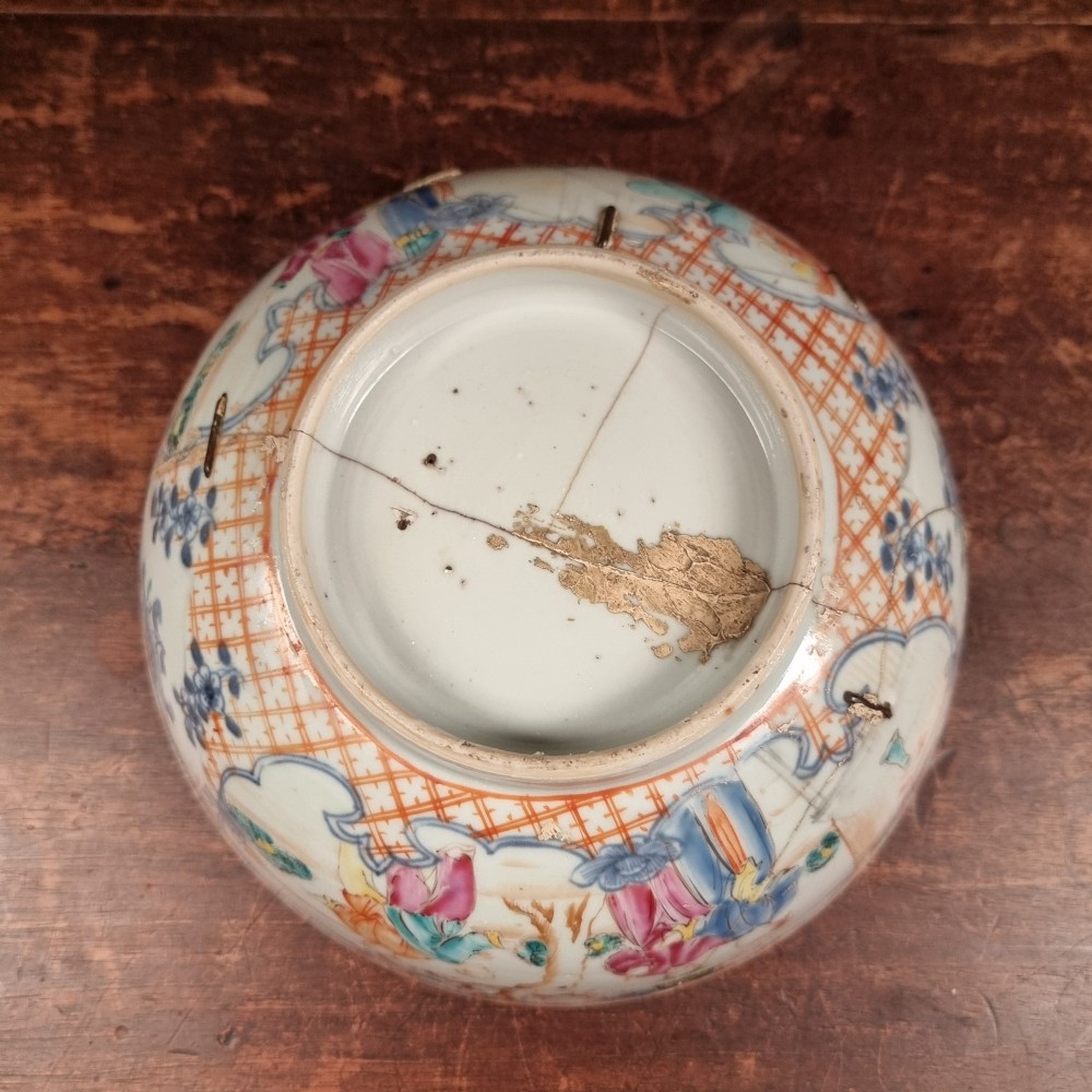 A 19th-century footed Chinese porcelain bowl featuring hand-painted figurative scenes in polychrome enamels with red lattice borders. View VIII