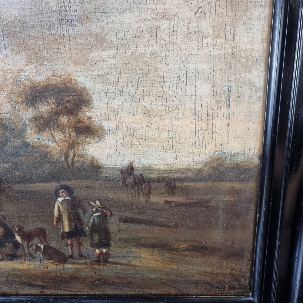 A late 17th-century oil painting on canvas depicting figures with horses and dogs in a pastoral landscape, housed in a black ebonised wooden frame. View IV