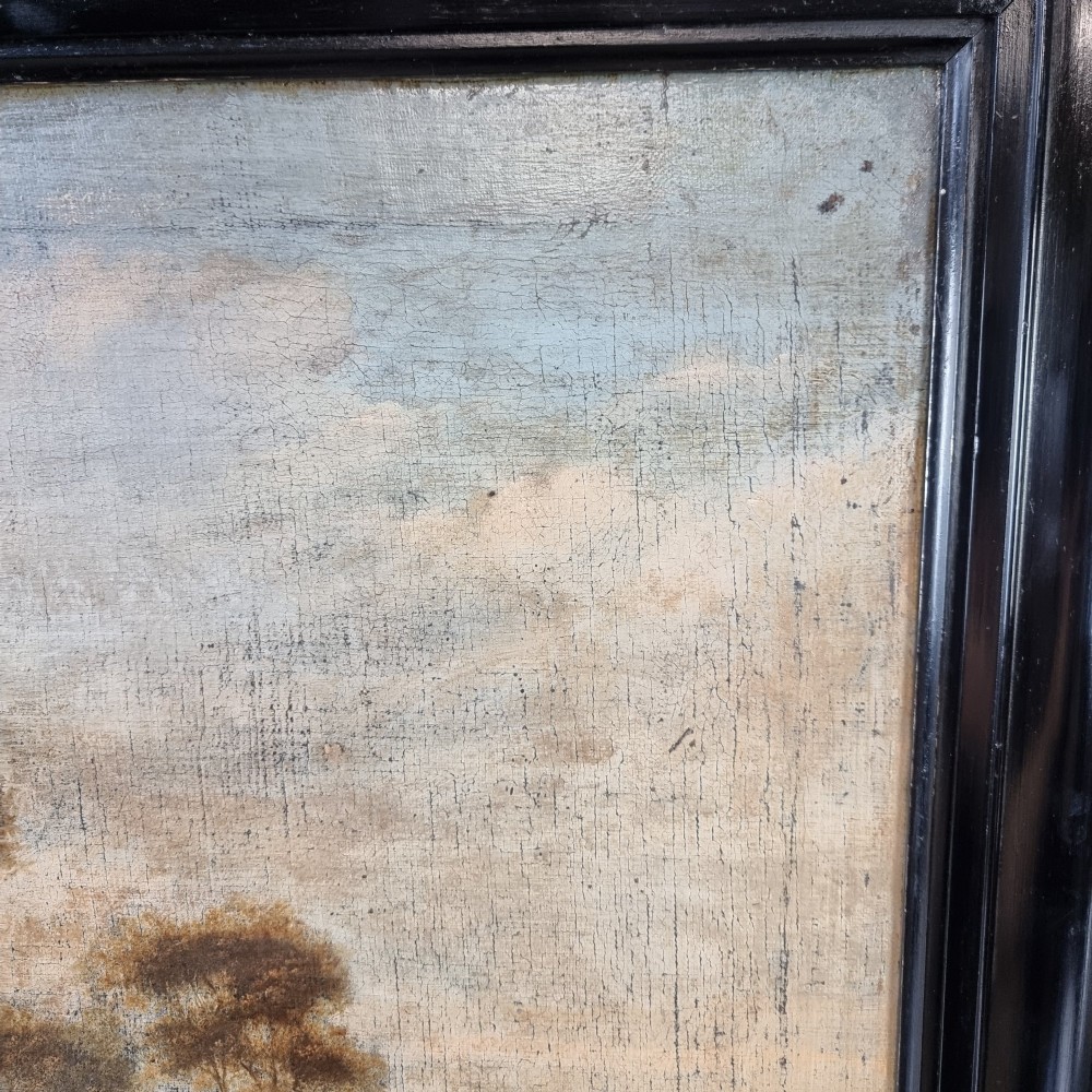A late 17th-century oil painting on canvas depicting figures with horses and dogs in a pastoral landscape, housed in a black ebonised wooden frame. View V