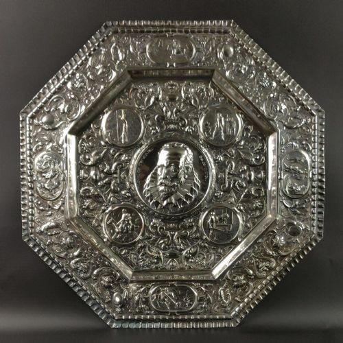A Large 19th Century Repoussé Charger Depicting Miguel De Cervantes.
