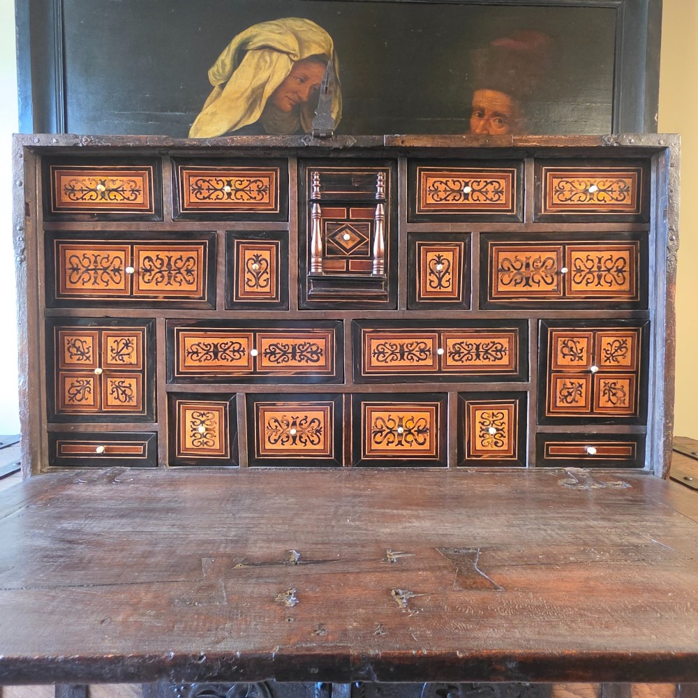A 17th century inlaid cabinet.