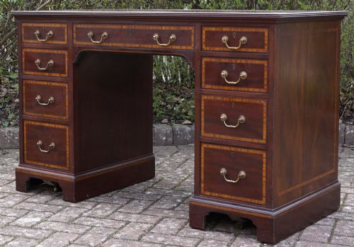 fine quality mahogany nine drawer writingdesk table with satinwood banding - CATEGORY: ANTIQUE DESKS - DATED 1910