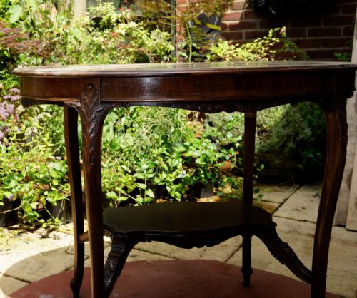 A FINE QUALITY LATE VICTORIAN OVAL MAHOGANY TABLE WITH FINE CARVED DETAIL - ADDITIONAL PHOTO 6