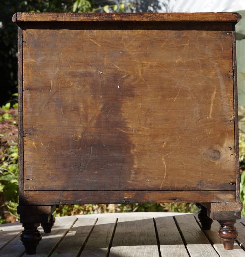 EARLY VICTORIAN MINIATURE MAHOGANY CHEST OF DRAWERS SUPPORTED ON FOUR FINELY TURNED FEET - ADDITIONAL PHOTO 5