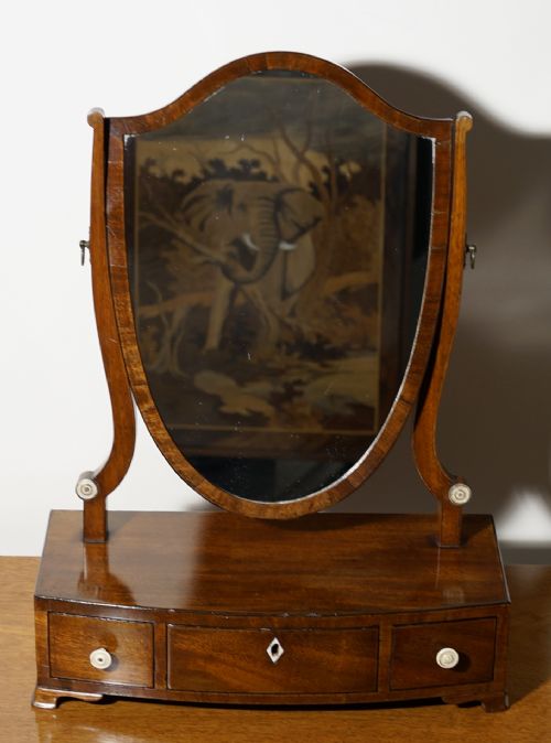 mahogany bow fronted and inlaid threedrawer mirror with attractive shield shaped mirror - CATEGORY: ANTIQUE MIRRORS - DATED 19TH CENTURY