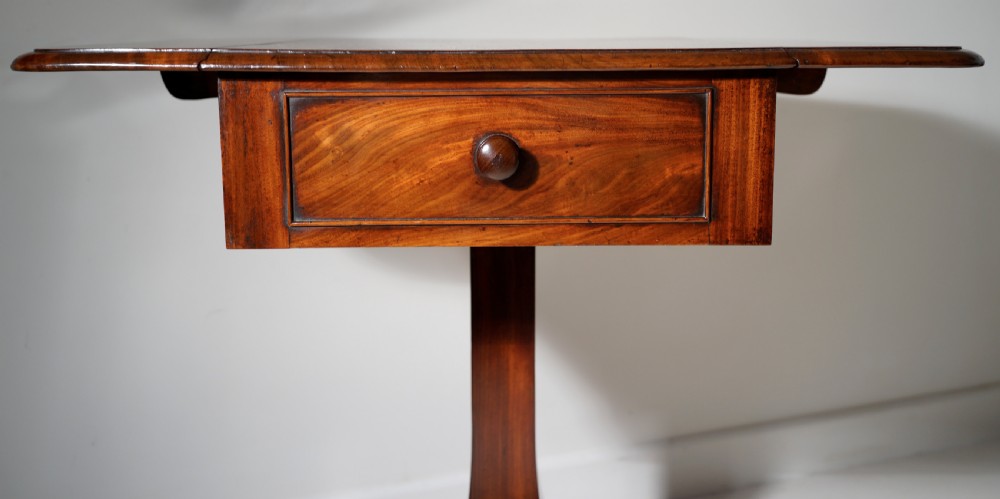 A good quality nicely figured solid mahogany drop flap centre support occasional table in excellent  View II
