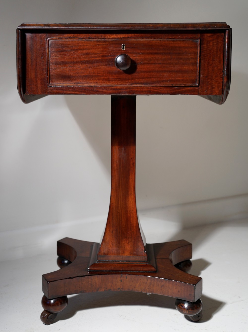 A good quality nicely figured solid mahogany drop flap centre support occasional table in excellent  View IV