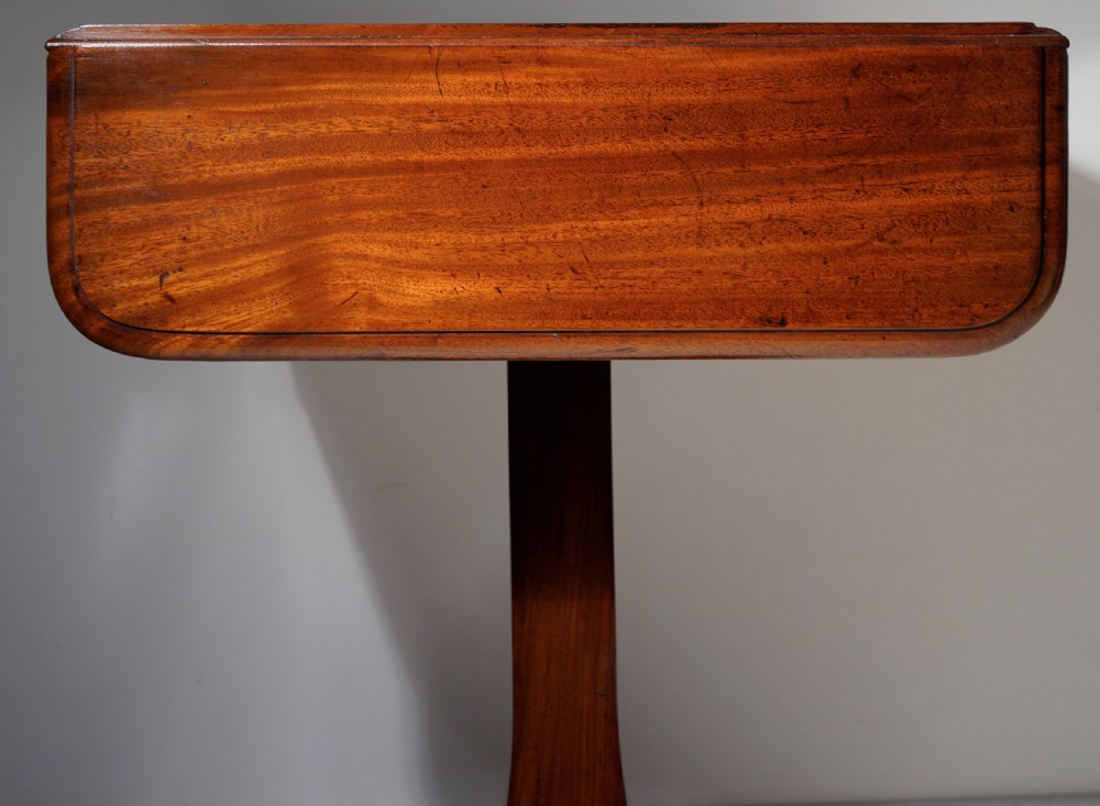 A good quality nicely figured solid mahogany drop flap centre support occasional table in excellent  View V