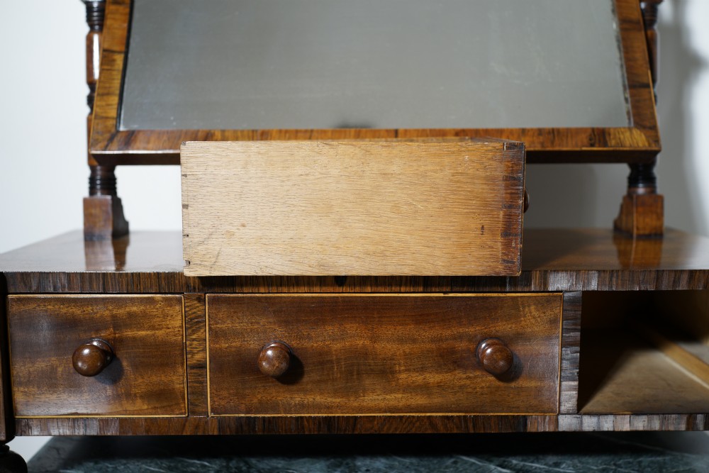 A good Regency three-drawer oak lined mahogany and rosewood with boxwood stringing toilet mirror. View V