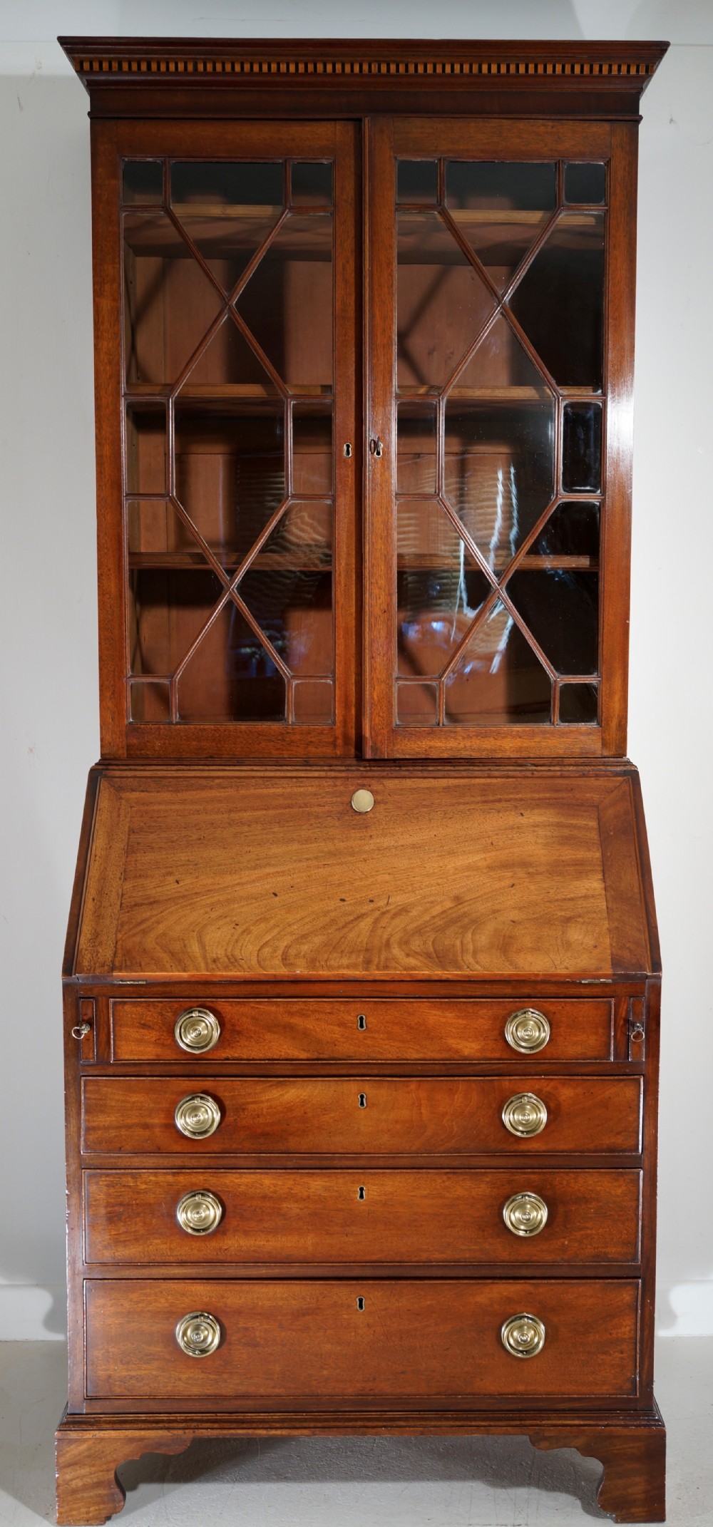 A fine quality Georgian Mahogany bureau bookcase of small proportions.