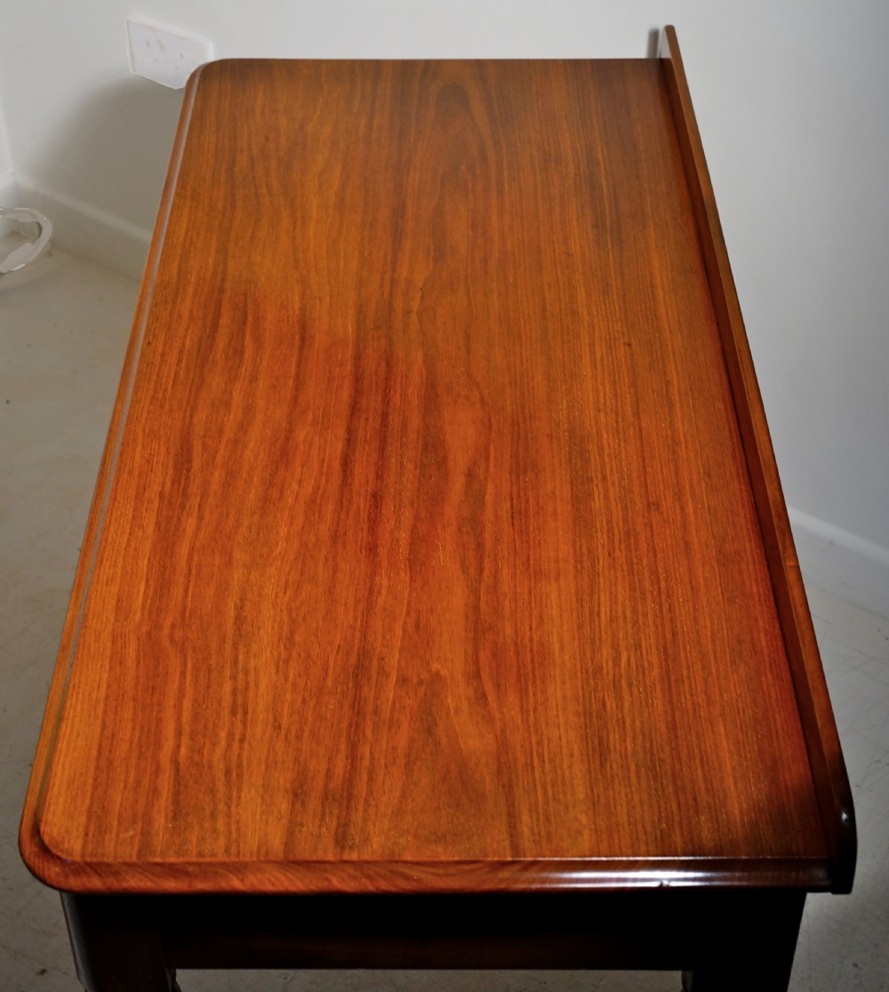 Victorian 1860s mahogany table with two drawers supported on four turned tapering legs. View VII